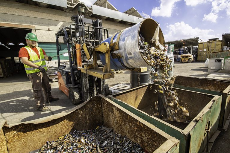 A forklift pours freshness into a container